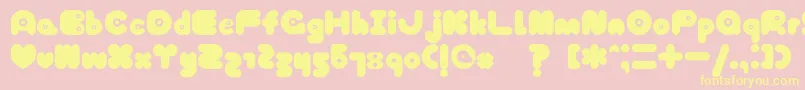 フォントTokyoHoneyChan – 黄色のフォント、ピンクの背景