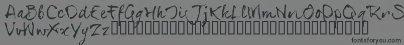 SerialsT-Schriftart – Schwarze Schriften auf grauem Hintergrund