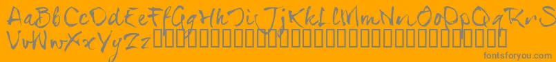 SerialsT-fontti – harmaat kirjasimet oranssilla taustalla
