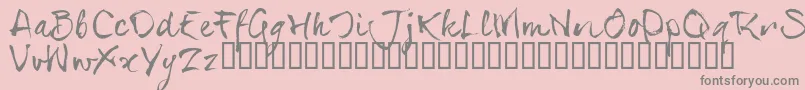 SerialsT-fontti – harmaat kirjasimet vaaleanpunaisella taustalla