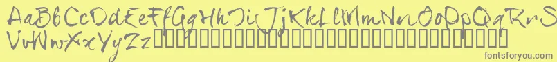 SerialsT-fontti – harmaat kirjasimet keltaisella taustalla