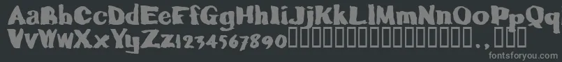 Caljoetrial-fontti – harmaat kirjasimet mustalla taustalla