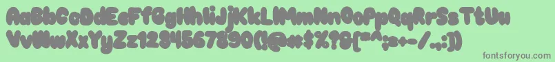 Chokooutline Font – Gray Fonts on Green Background