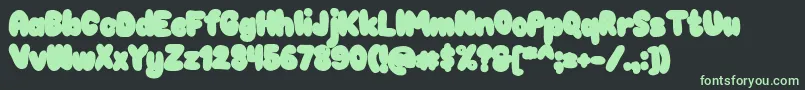 Chokooutline Font – Green Fonts on Black Background