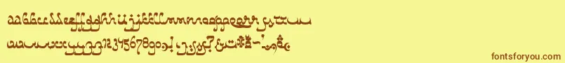 フォントCab – 茶色の文字が黄色の背景にあります。