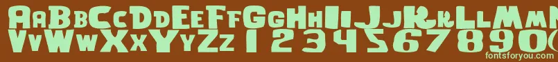 フォントGhostwordsRegular – 緑色の文字が茶色の背景にあります。