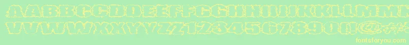 VtcAngorachikOutline Font – Yellow Fonts on Green Background