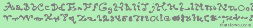 フォントKkendcld – 緑の背景に灰色の文字