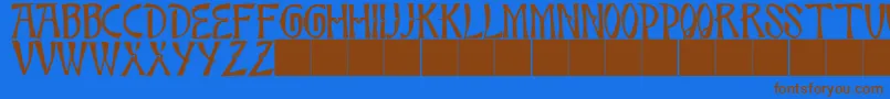 Fonte JmhBambooCaps – fontes marrons em um fundo azul