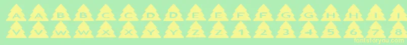 Asxmastrees Font – Yellow Fonts on Green Background