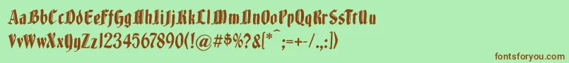 フォントBrokenwoodtypes – 緑の背景に茶色のフォント