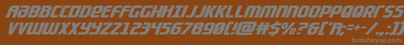 Lightsidercompactital-fontti – harmaat kirjasimet ruskealla taustalla
