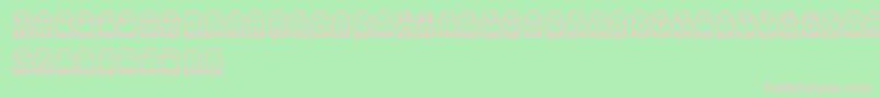 フォントFantasmytasSt – 緑の背景にピンクのフォント
