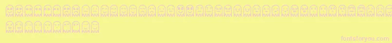 FantasmytasSt-fontti – vaaleanpunaiset fontit keltaisella taustalla