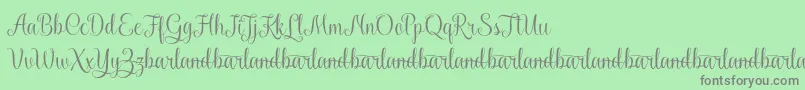 Weitere Informationen zur KaiyilaScriptDemo-Schriftart KaiyilaScriptDemo-Schriftart – Graue Schriften auf grünem Hintergrund