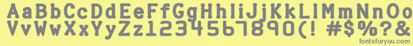 フォントHalterp ffy – 黄色の背景に灰色の文字
