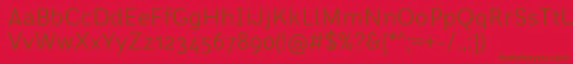 FontRodonaRegularBeta-Schriftart – Braune Schriften auf rotem Hintergrund