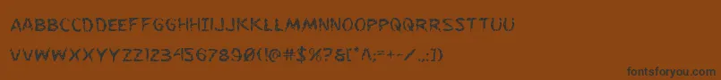 フォントFlesheating – 黒い文字が茶色の背景にあります