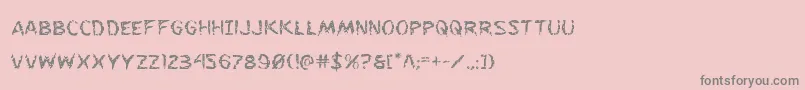 フォントFlesheating – ピンクの背景に灰色の文字