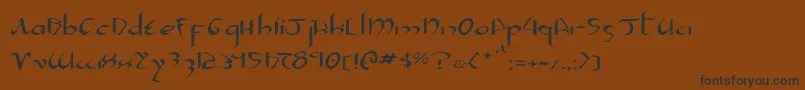 フォントXaphan2e – 黒い文字が茶色の背景にあります