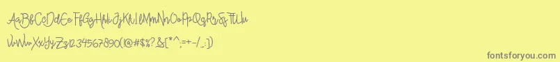 AlleanaScriptフォントについての詳細 フォントAlleanaScript – 黄色の背景に灰色の文字
