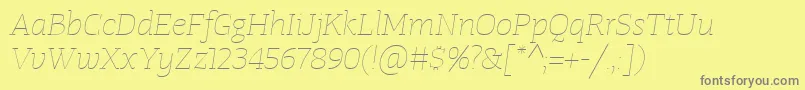 fuente TangerserifwideUltralightitalic – Fuentes Grises Sobre Fondo Amarillo