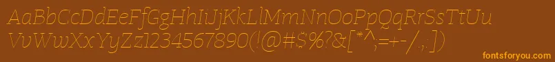Шрифт TangerserifwideUltralightitalic – оранжевые шрифты на коричневом фоне