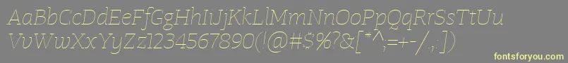 Шрифт TangerserifwideUltralightitalic – жёлтые шрифты на сером фоне