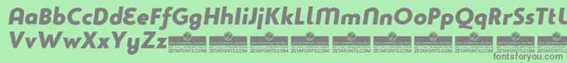 Studiogothic-Schriftart – Graue Schriften auf grünem Hintergrund