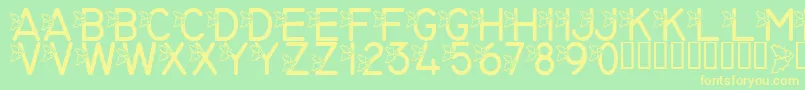 LmsJollyHollyday-fontti – keltaiset fontit vihreällä taustalla