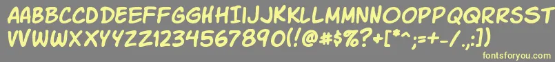 Komikask Font – Yellow Fonts on Gray Background