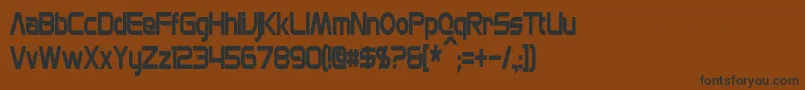 フォントMonsOlympiaCondensedBold – 黒い文字が茶色の背景にあります