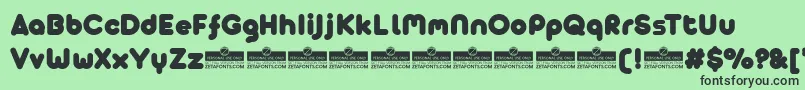 Czcionka AristaProAlternateFatTrial – czarne czcionki na zielonym tle