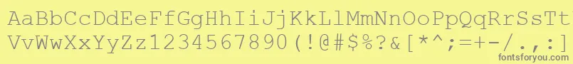 フォントPhaisarn – 黄色の背景に灰色の文字