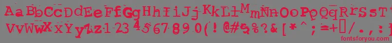 フォントScrewedUpTypewriter – 赤い文字の灰色の背景