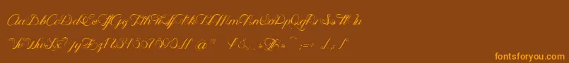 OpheliaScript Font – Orange Fonts on Brown Background