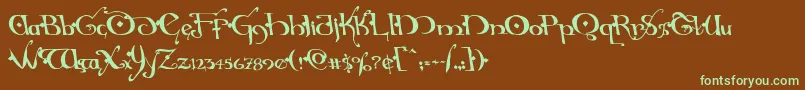 フォントHollyjinglesolidleft – 緑色の文字が茶色の背景にあります。