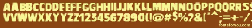 Vtcbadvision-Schriftart – Gelbe Schriften auf braunem Hintergrund