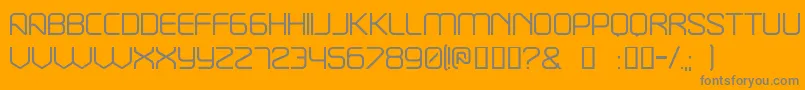 Break-fontti – harmaat kirjasimet oranssilla taustalla
