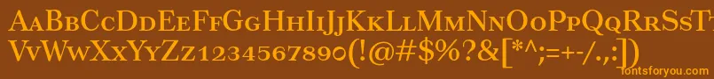 Tusartextsc-Schriftart – Orangefarbene Schriften auf braunem Hintergrund