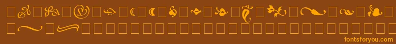 Шрифт AtlantixOrnamentsSsi – оранжевые шрифты на коричневом фоне