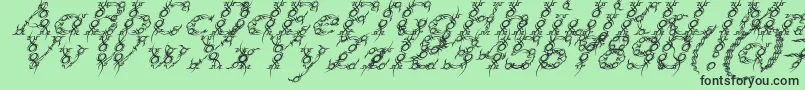 TribouItalicフォントについての詳細 フォントTribouItalic – 緑の背景に黒い文字