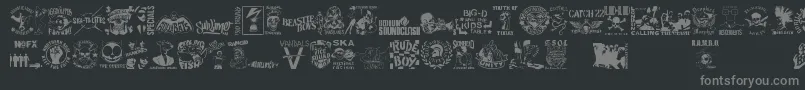 Fonte StencilPunksDings – fontes cinzas em um fundo preto