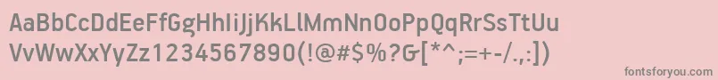 PfhandbookproMedium-fontti – harmaat kirjasimet vaaleanpunaisella taustalla