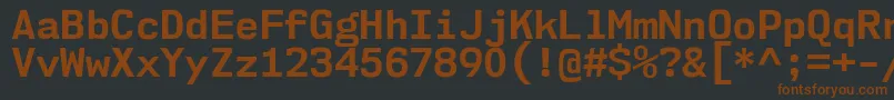Fonte Nk57MonospaceNoBd – fontes marrons em um fundo preto