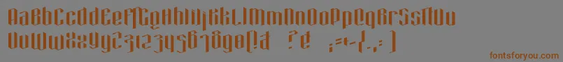 フォントHexa – 茶色の文字が灰色の背景にあります。