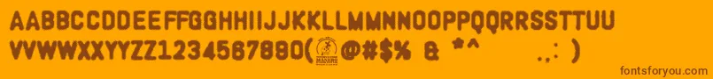 WoodcutterOligarquia Font – Brown Fonts on Orange Background