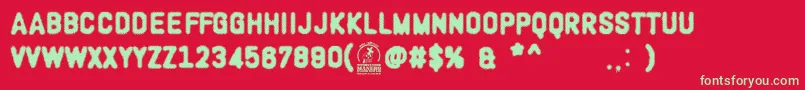 WoodcutterOligarquia Font – Green Fonts on Red Background