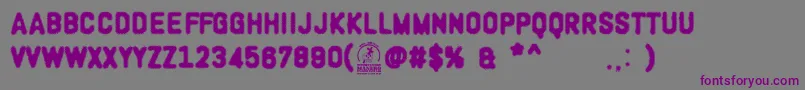 WoodcutterOligarquia Font – Purple Fonts on Gray Background