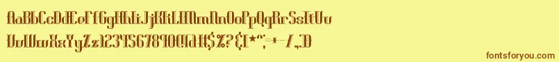 フォントBlonirex – 茶色の文字が黄色の背景にあります。